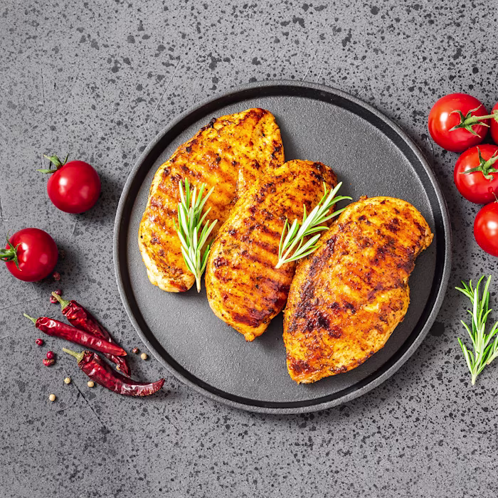 Plate with grilled maple mustard chicken breasts