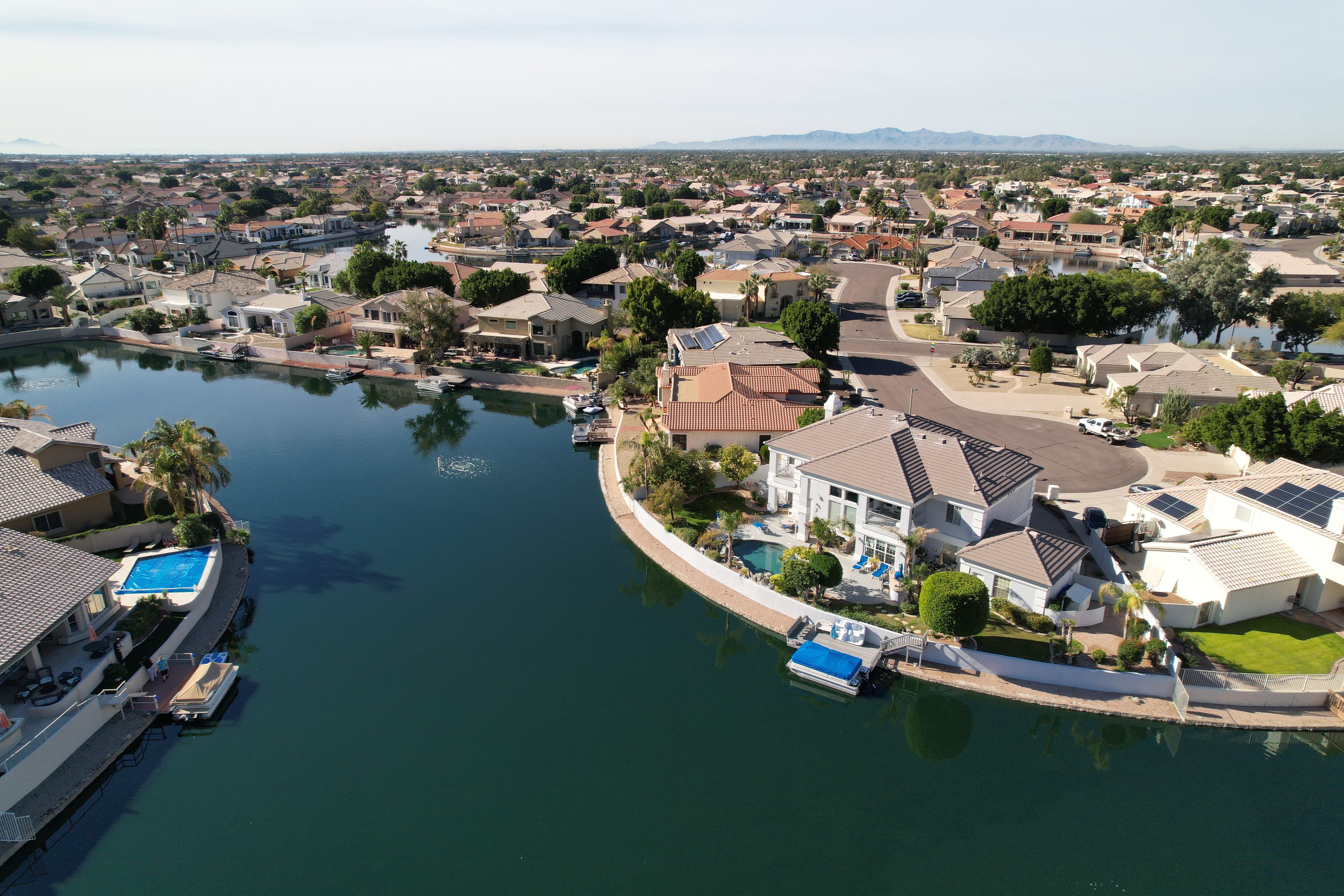 Aerial view of Glendale, AZ with houses near a river