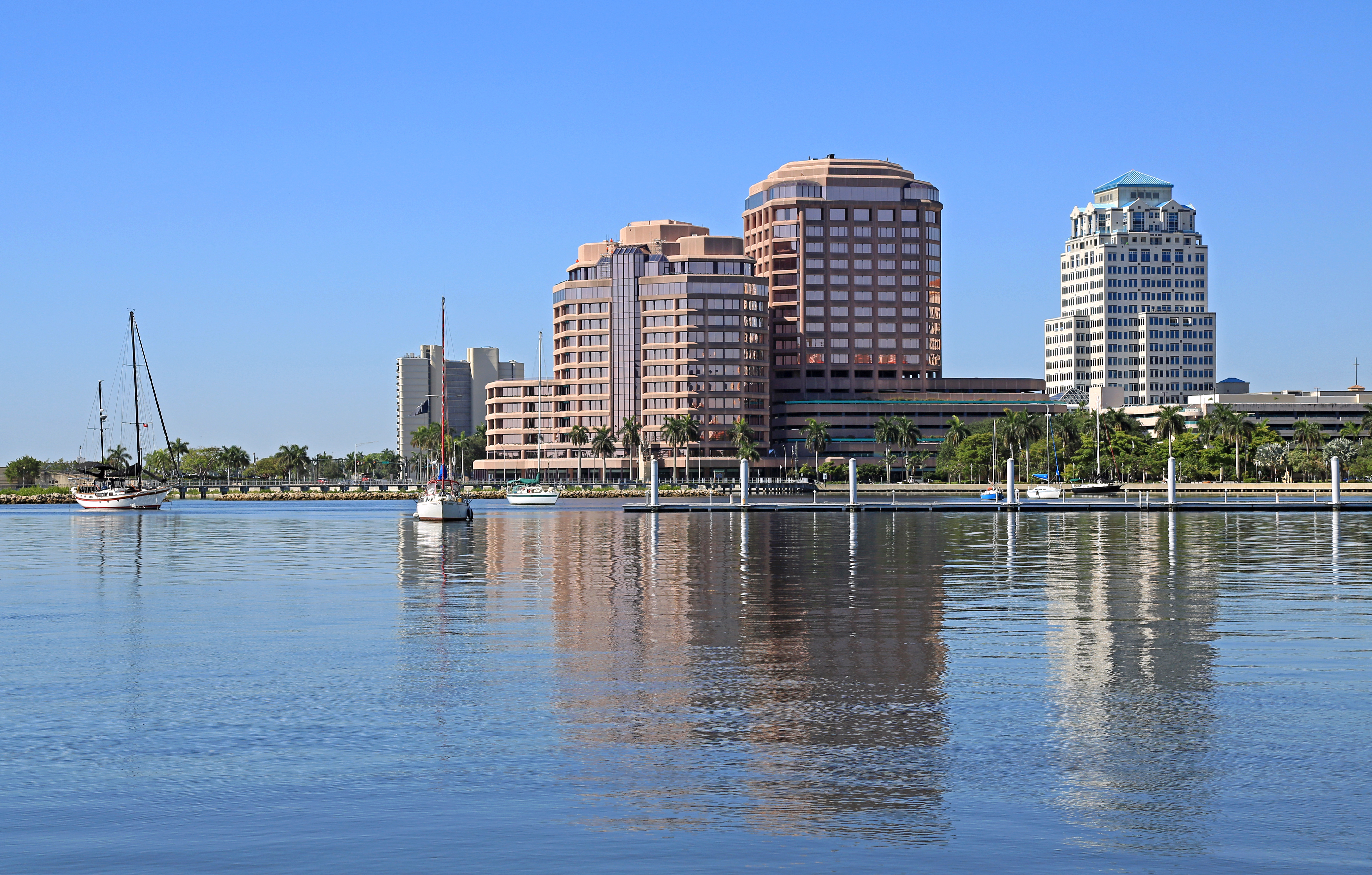 Skyscrapers next to a port and water