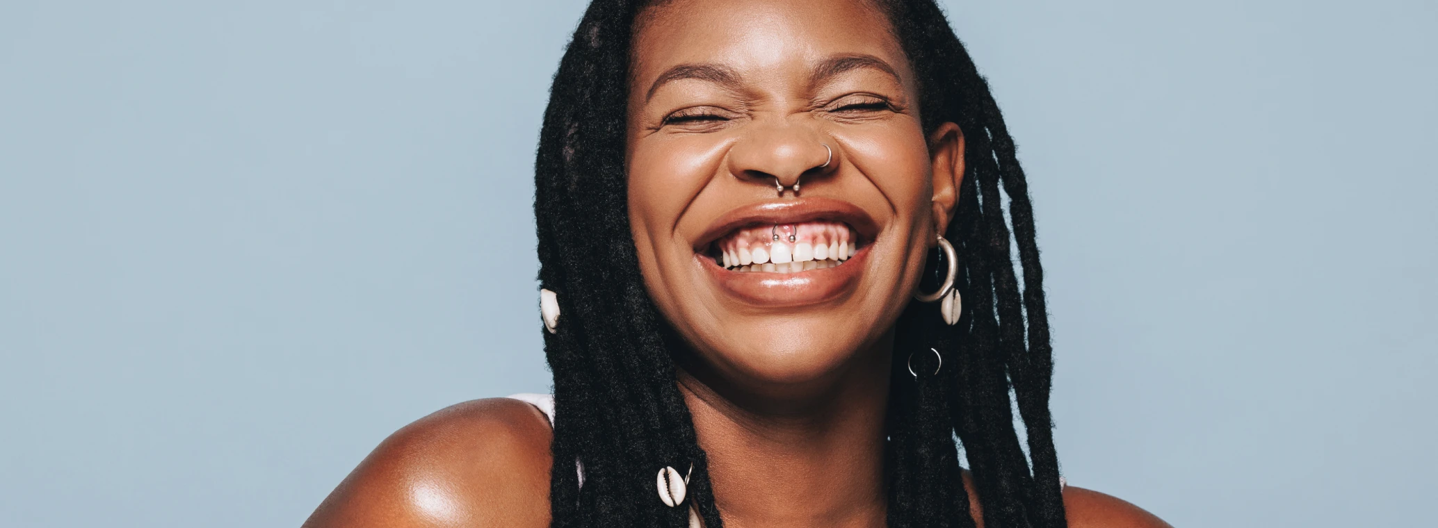 A person showing off their white teeth | Crest 