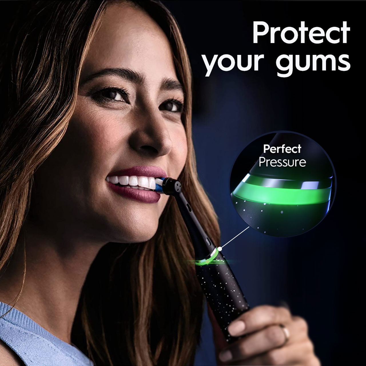 Woman brushing her teeth with an Oral-B iO Series Electric Toothbrush