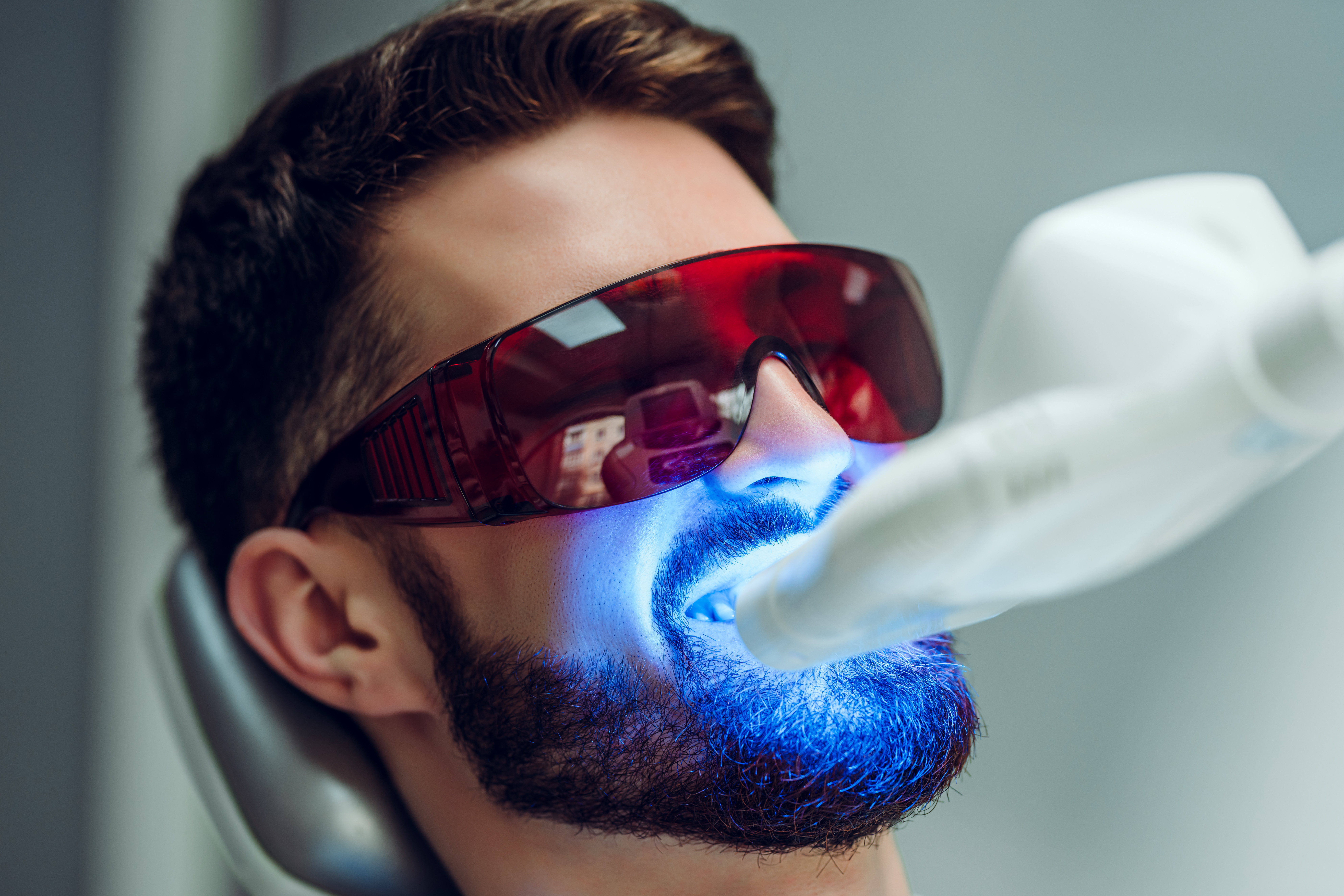 A person getting their teeth professionally whitened | Crest 