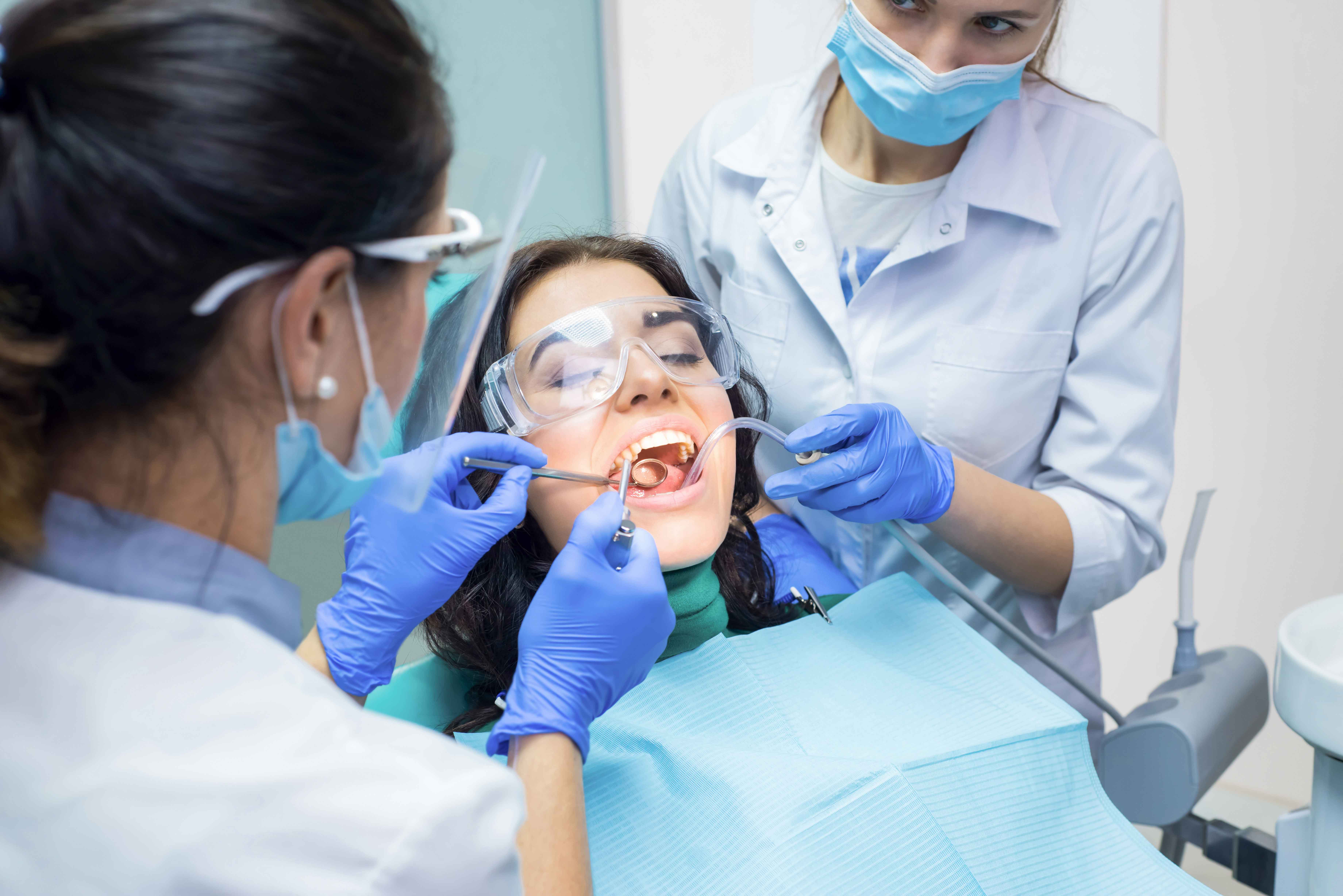 Image of someone receiving a professional dental cleaning | Crest 