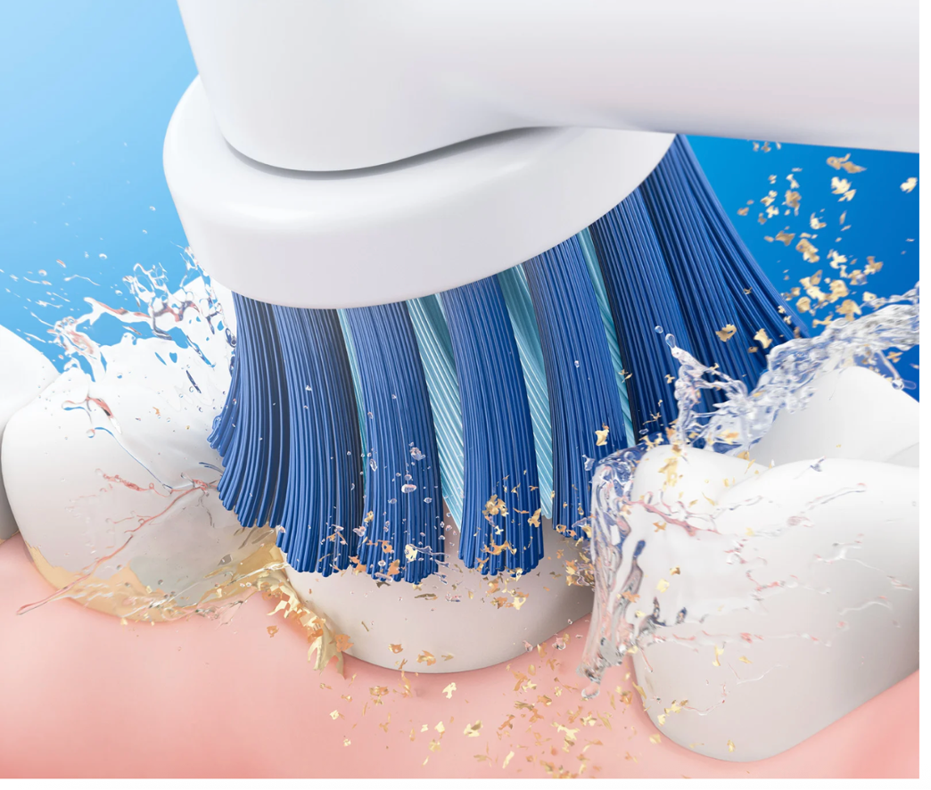 Close-up of an electric toothbrush cleaning teeth   Source: Lumiere BFO Images 