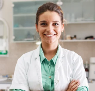 Dentist professional standing with their arms folded