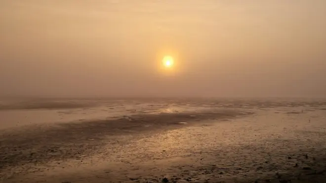 Zonsopkomst boven de Slufter op Texel - Frans Alderse Baas