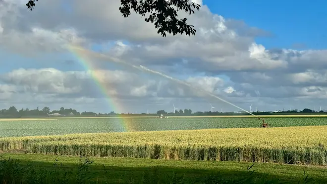 Stapelwolken en een beregenboog - Jolanda Bakker