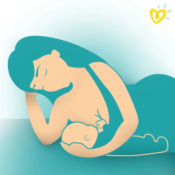 Mère allaitant utilisant la position couchée sur le côté