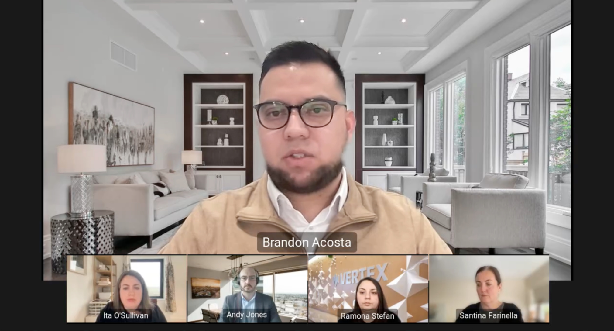 A professional screenshot from a Vertex webinar titled "Automating Tax for E-commerce & Marketplace Businesses." The main video feed features speaker Mirakl Sr. Solution Consultant Brandon Acosta, a man with glasses and a tan jacket, appearing in front of a bright, modern living room background. Along the bottom of the screen are four smaller video panels for the other presenters: Vertex Principle Product Manager Ita O'Sullivan, EY Partner Andy Jones, Vertex Principal Tax Analyst Ramona Stefan (positioned in front of a Vertex-branded wall), and Shopify Senior Lead Global Product Partnerships Santina Farinella.