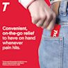 Person placing a pack of TYLENOL EASY DISSOLVE into their jeans pocket