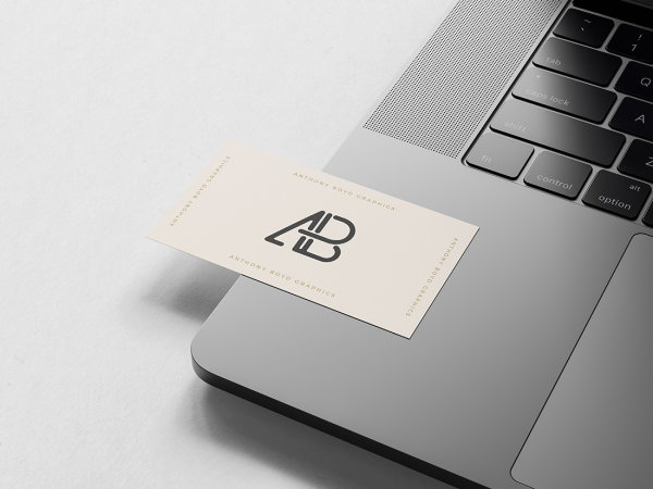 Business Card on Macbook Pro Mockup by Anthony Boyd Graphics