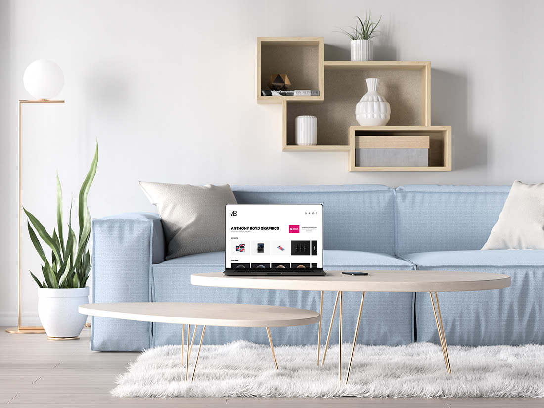 Bezel-Less MacBook Pro in Living Room Mockup by Anthony Boyd Graphics