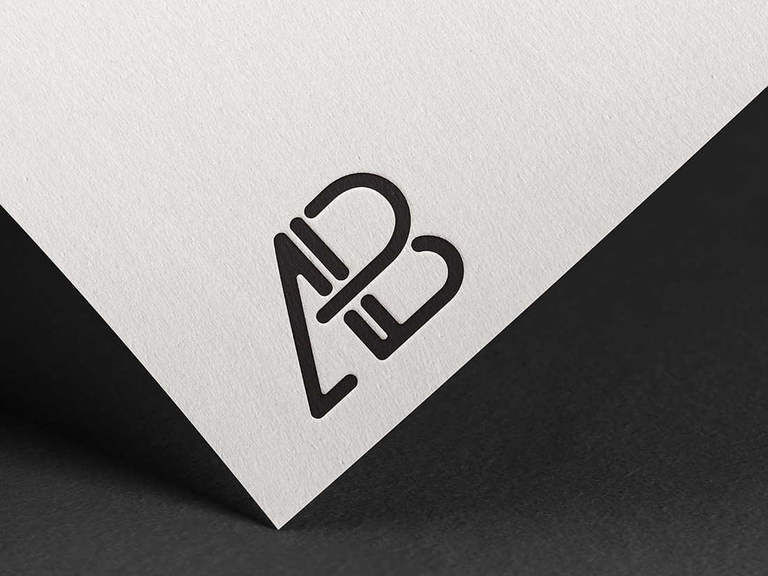 Embossed Logo Mockup by Anthony Boyd Graphics
