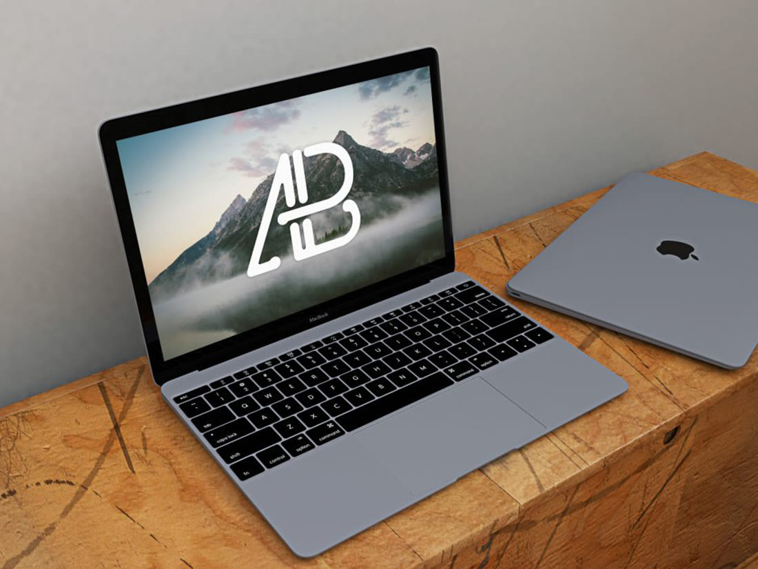 Free Realistic Space Grey Macbook Mockup by Anthony Boyd Graphics