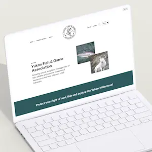 Yukon Fish and Game website homepage featuring outdoor and wildlife imagery with a nature-inspired design