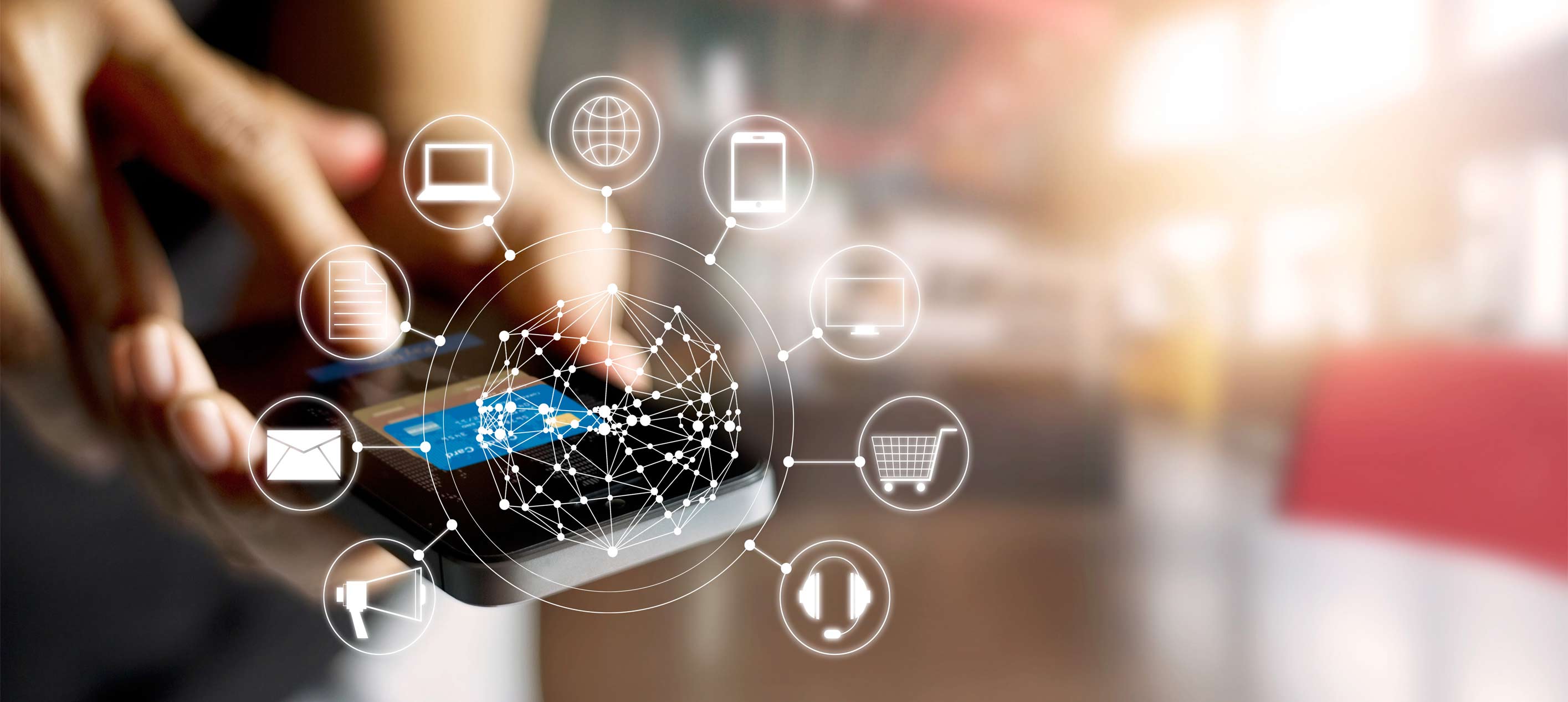 A person holding a phone with digital illustration of shopping icons