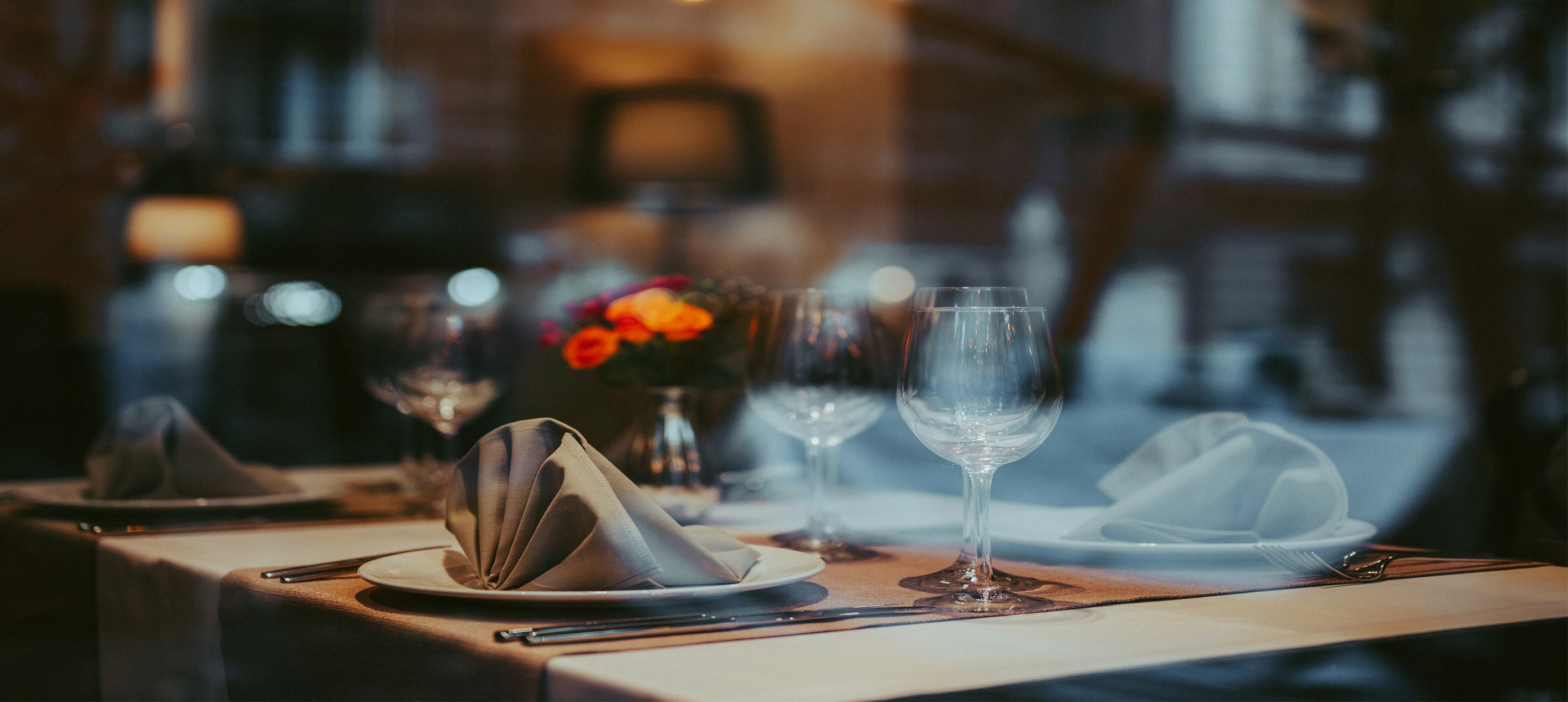 Elegant restaurant table setting at night