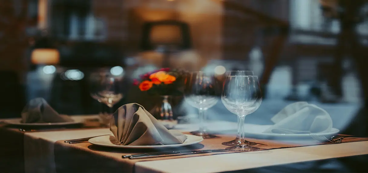 Elegant restaurant table setting at night