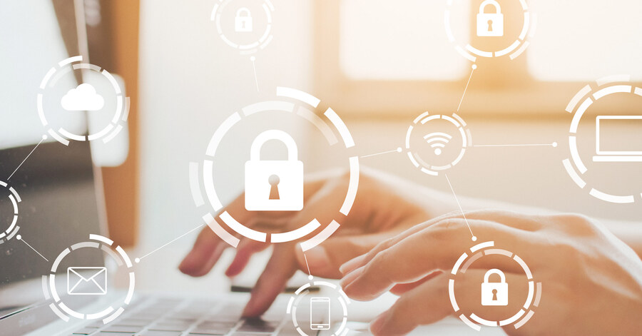 Hands typing on a laptop keyboard with digital security icons overlayed, including padlocks, cloud, email, and Wi-Fi symbols.