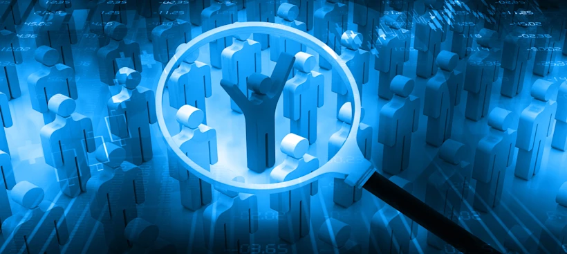 Magnifying glass highlighting a selected figure in a crowd