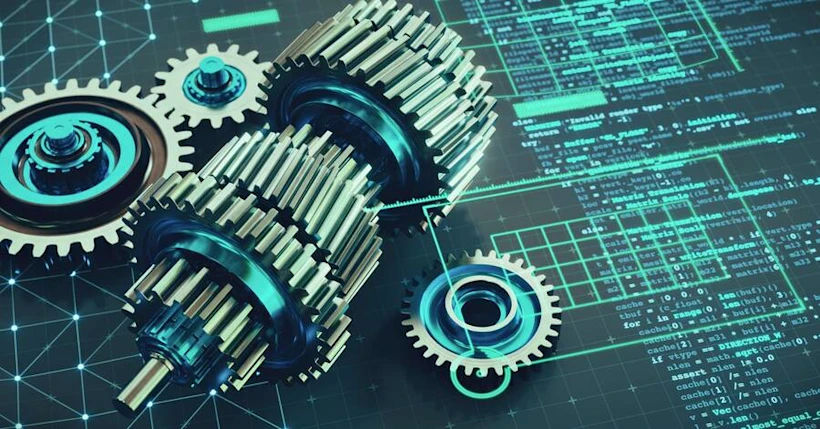 Mechanical gears placed on a digital interface displaying lines of computer code and technical diagrams in green and blue tones.
