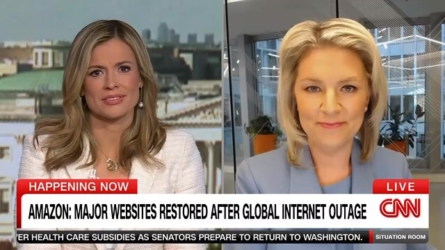 Two female news anchors in a split-screen live CNN broadcast discussing restoration of major websites after a global internet outage.