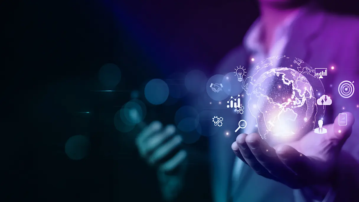 Business professional holding a glowing digital globe with floating technology and analytics icons