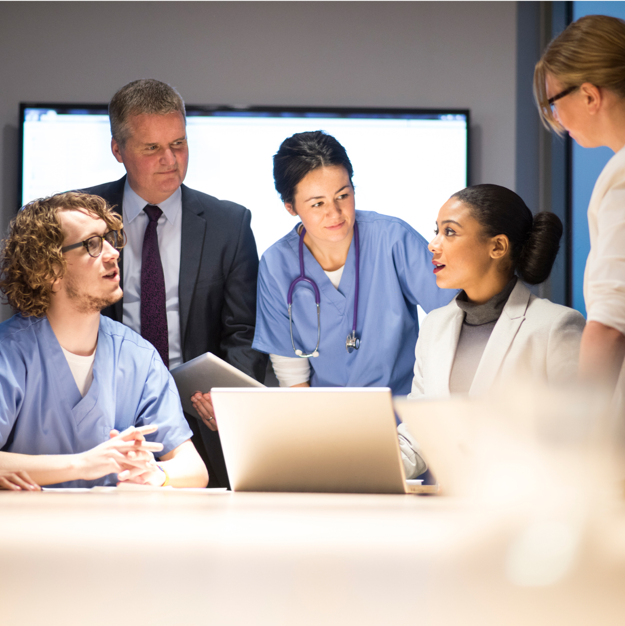 Medical team hear presentations from business.