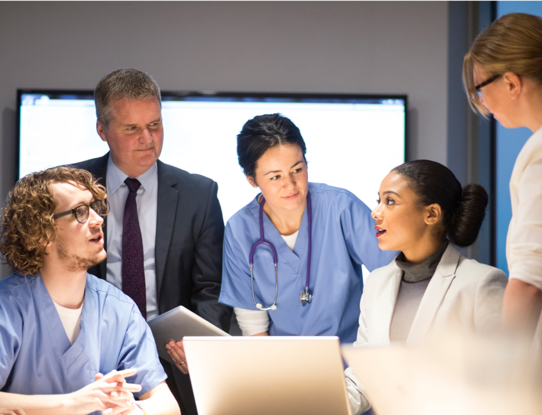 Medical team hear presentations from business.