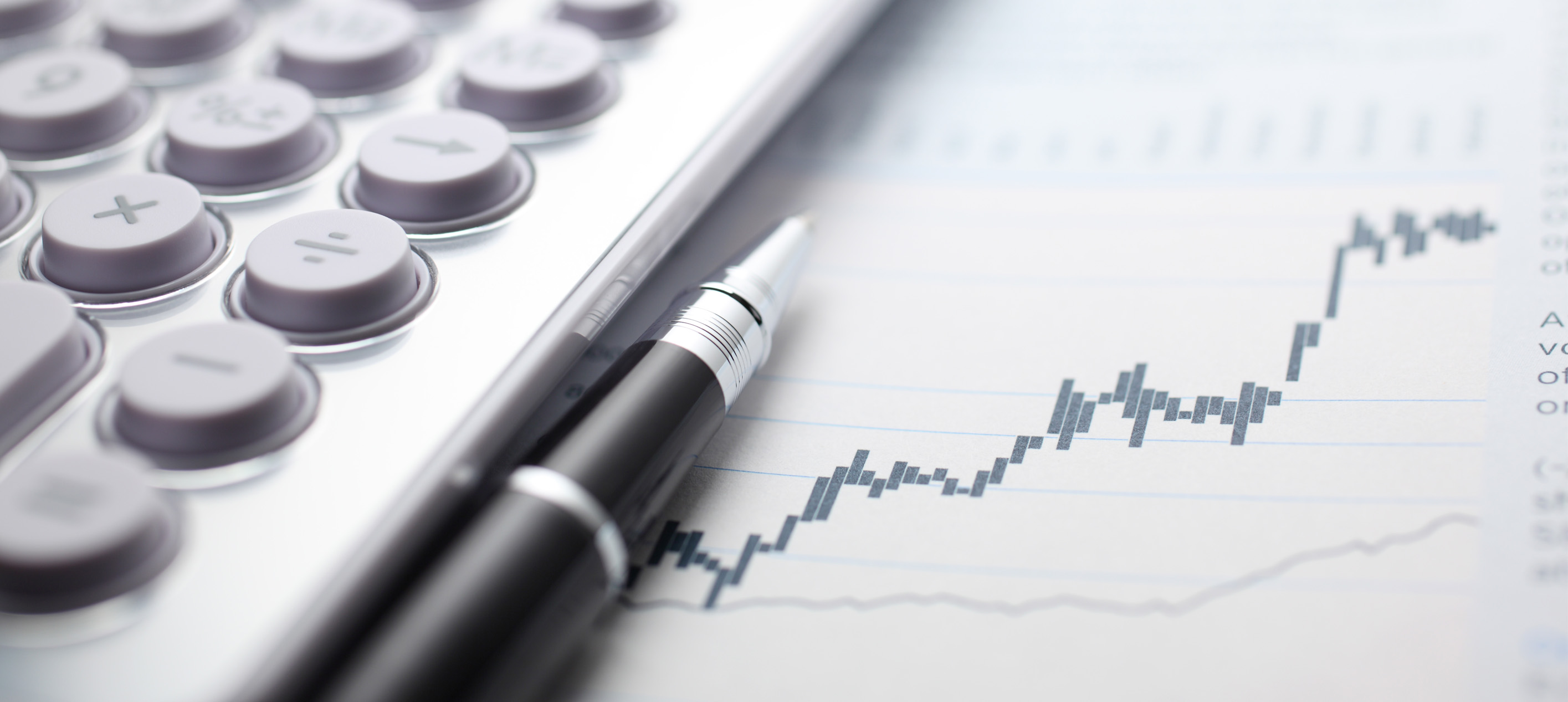 Calculator and Pen on a graph