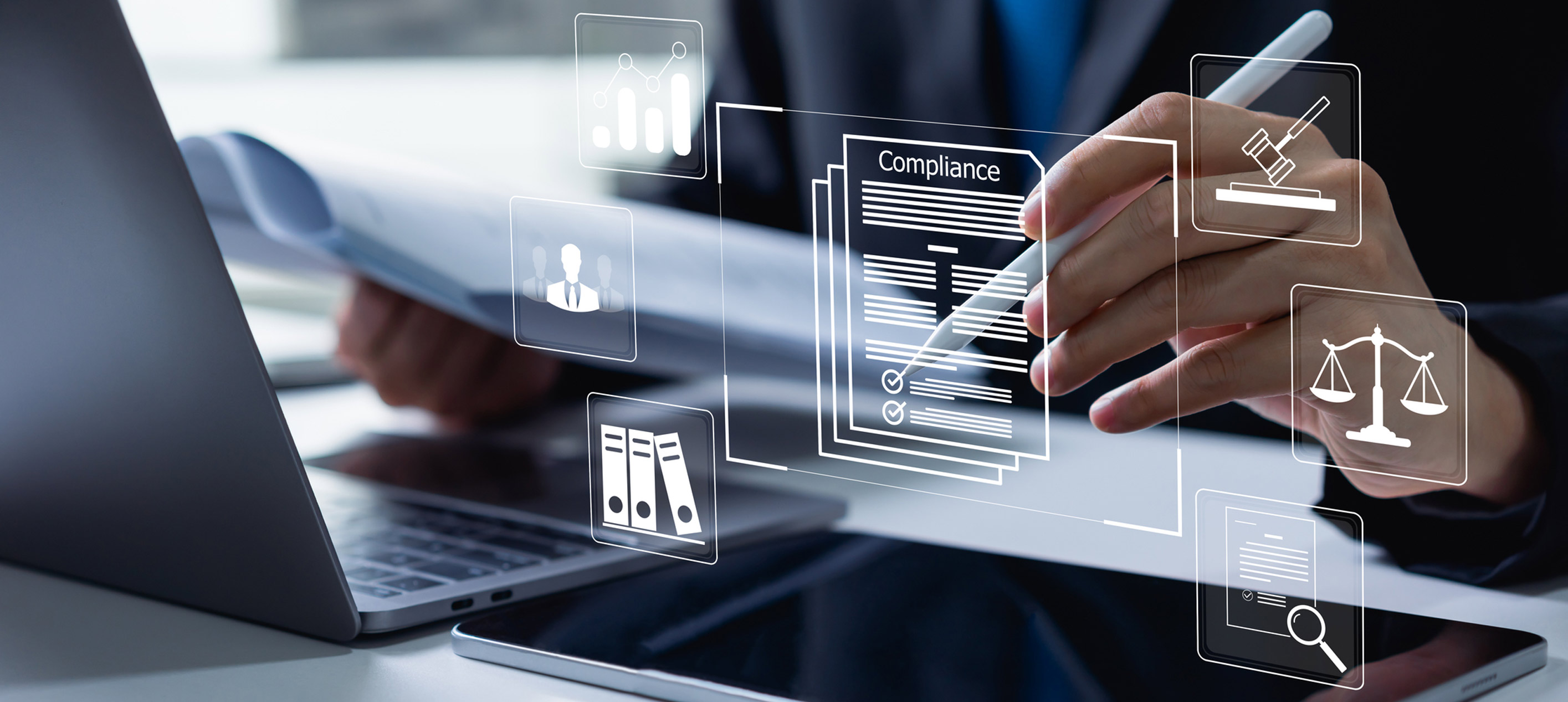 A hand holding a stylus over a digital compliance document, surrounded by floating icons including charts, scales and legal symbols.