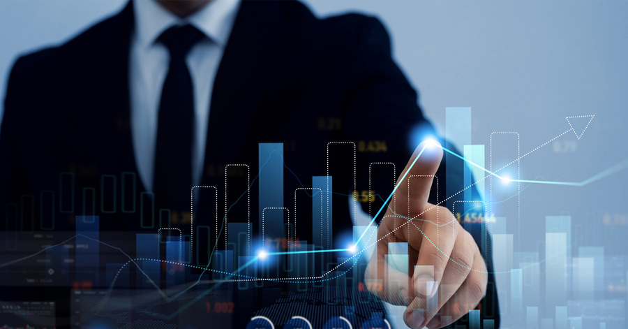 Business professional analyzing growth charts