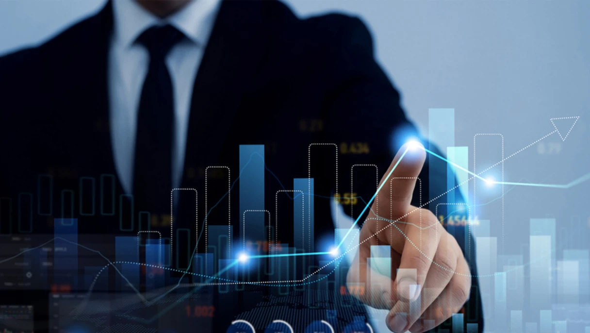 Business professional analyzing growth charts