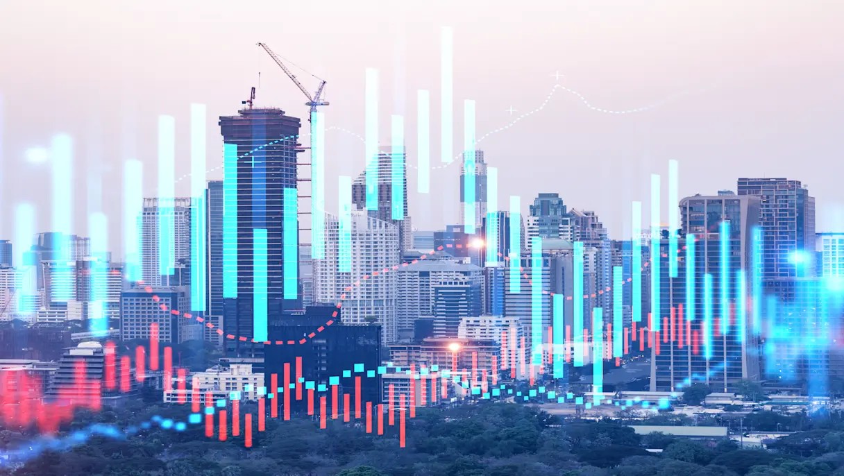 City skyline with financial growth chart