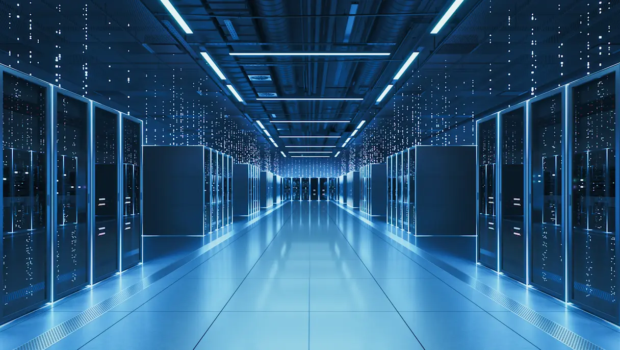 Modern data center with rows of illuminated server racks