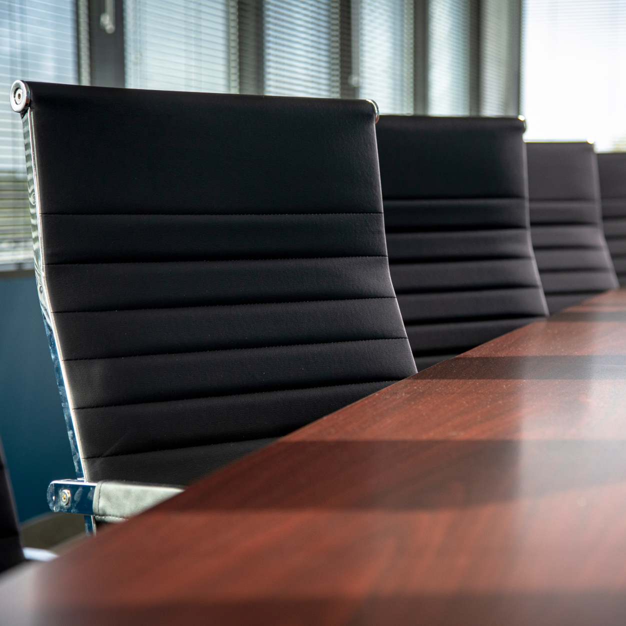 Modern office chairs at a conference room table