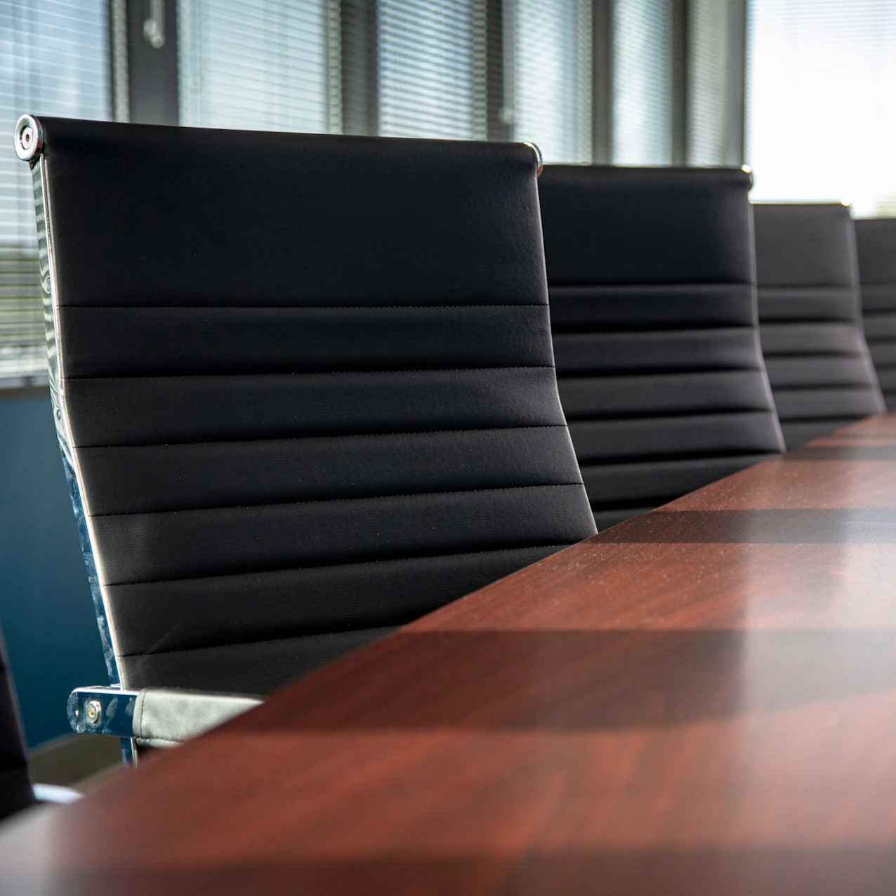 Modern office chairs at a conference room table