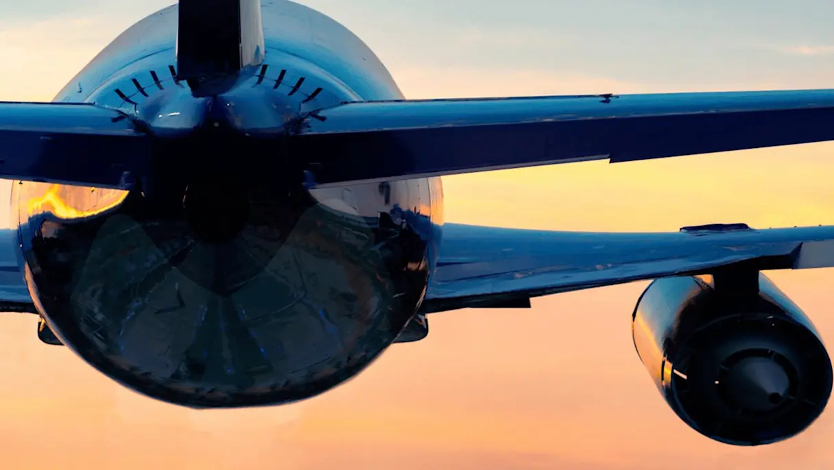 A Close up of an Airplane's Right Wing and Engine