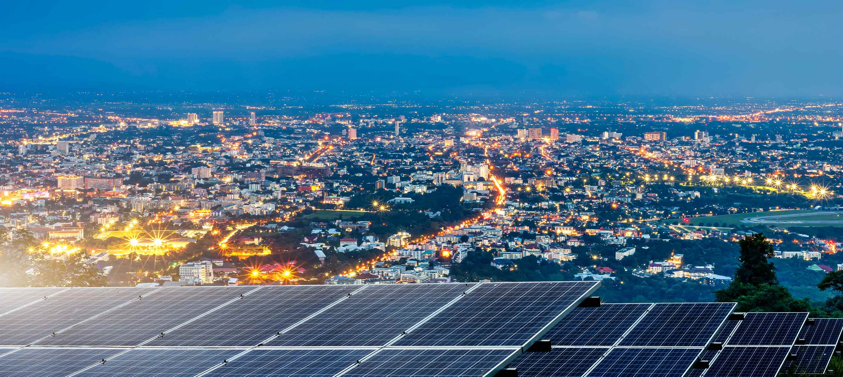 solar panels and city skyline