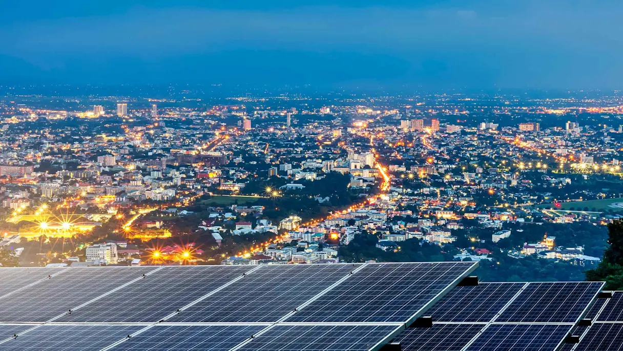 solar panels and city skyline