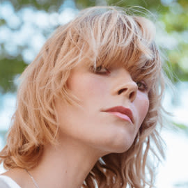 Wearing Bangs In The Summer: A Guide