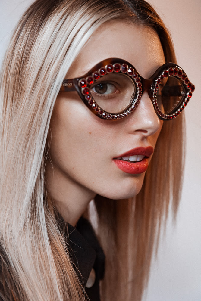 How To Style Statement Glasses Into The Gloss