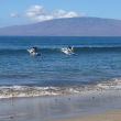 Jacquelyn Jablonski and Alana Zimmer surfing