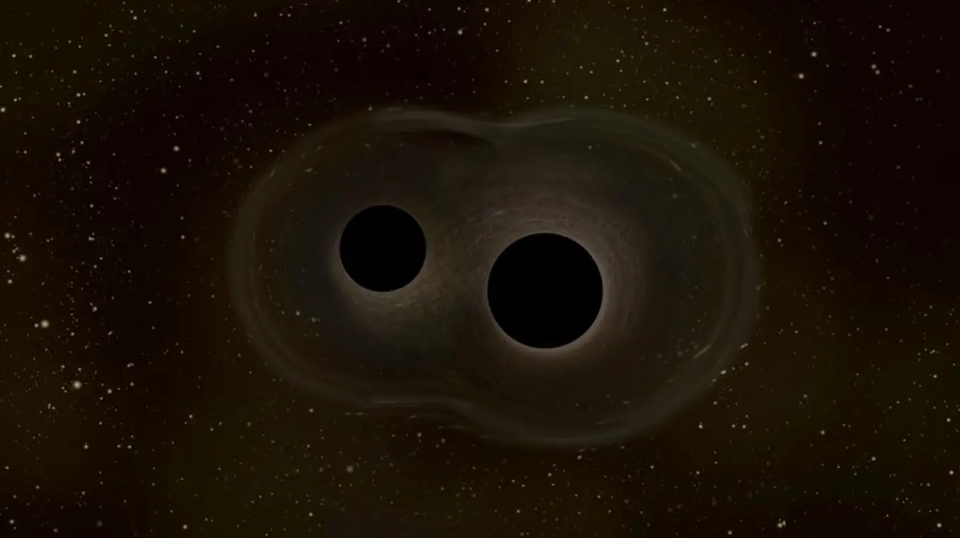 As two black holes orbit each other and merge, they emit gravitational waves that can be detected with instruments on Earth. By studying the detailed shape of these waves, scientists can probe the environment surrounding black holes and, in the future, learn more about the distribution and fundamental nature of dark matter. Image: ESA.