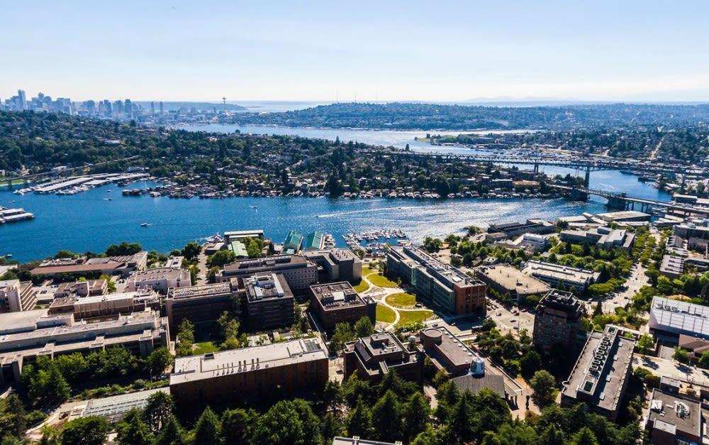 The offices of the Brotman Baty Institute and the UW Campus overlook Seattle’s Montlake Cut, Lake Union, and the city skyline. Photo courtesy of University of Washington Communications.