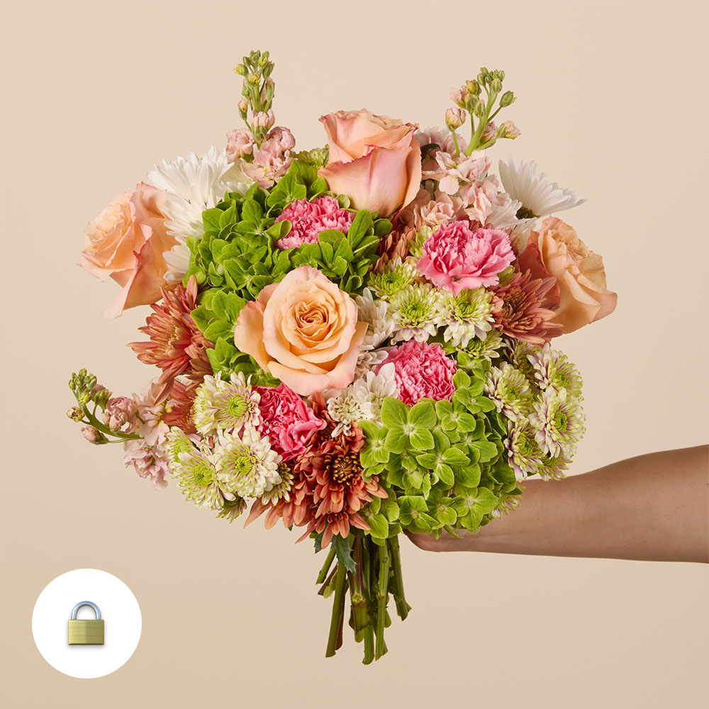 Green pink and peach mixed bouquet with roses and hydrangea