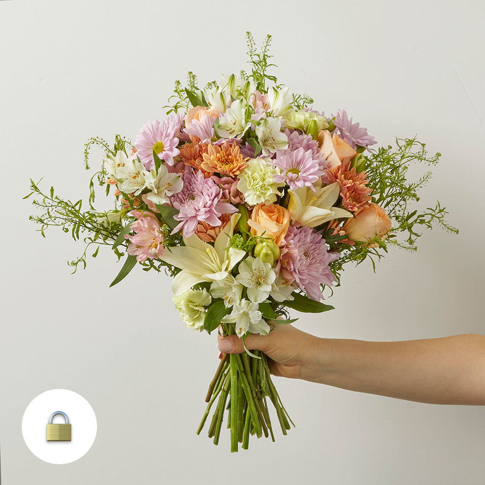 Mixed bouquet of white lilies, peach roses and purple mums