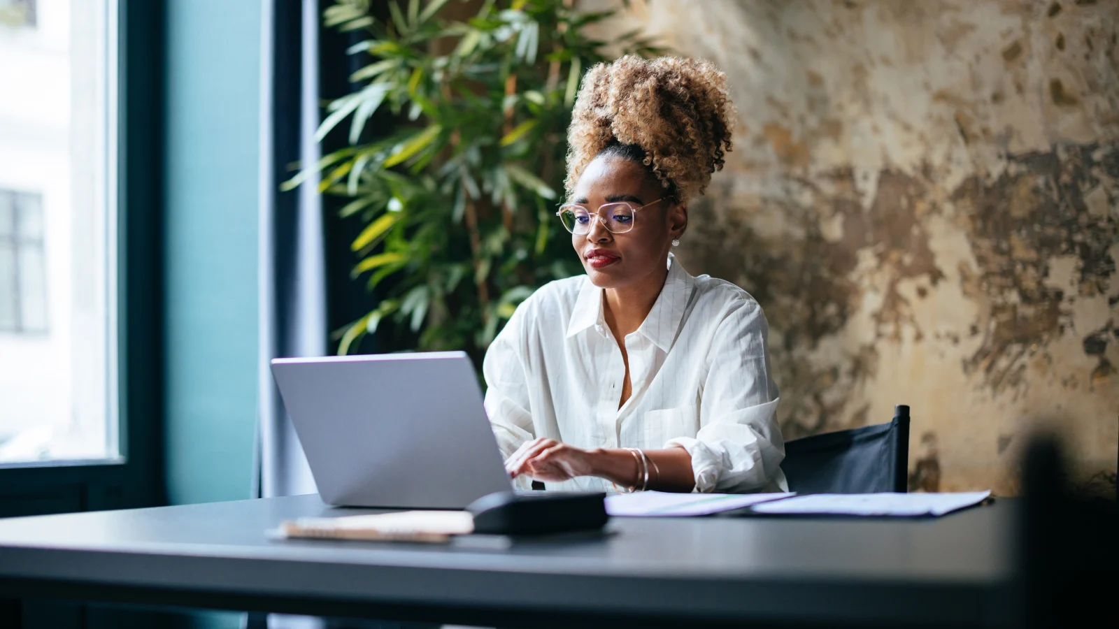 Businesswoman working on her computer.