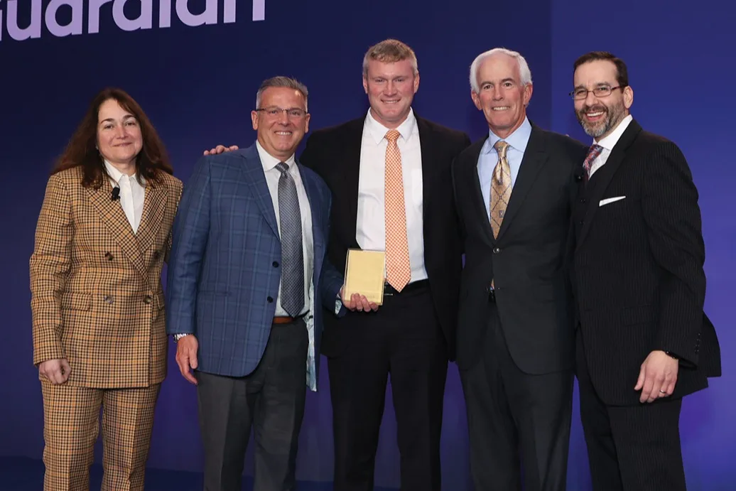 Boston, led by Tom Harmon, John Brady, and Seth Medalie, joined by Leyla Lesina on the left and Tim O’Donnell on the right