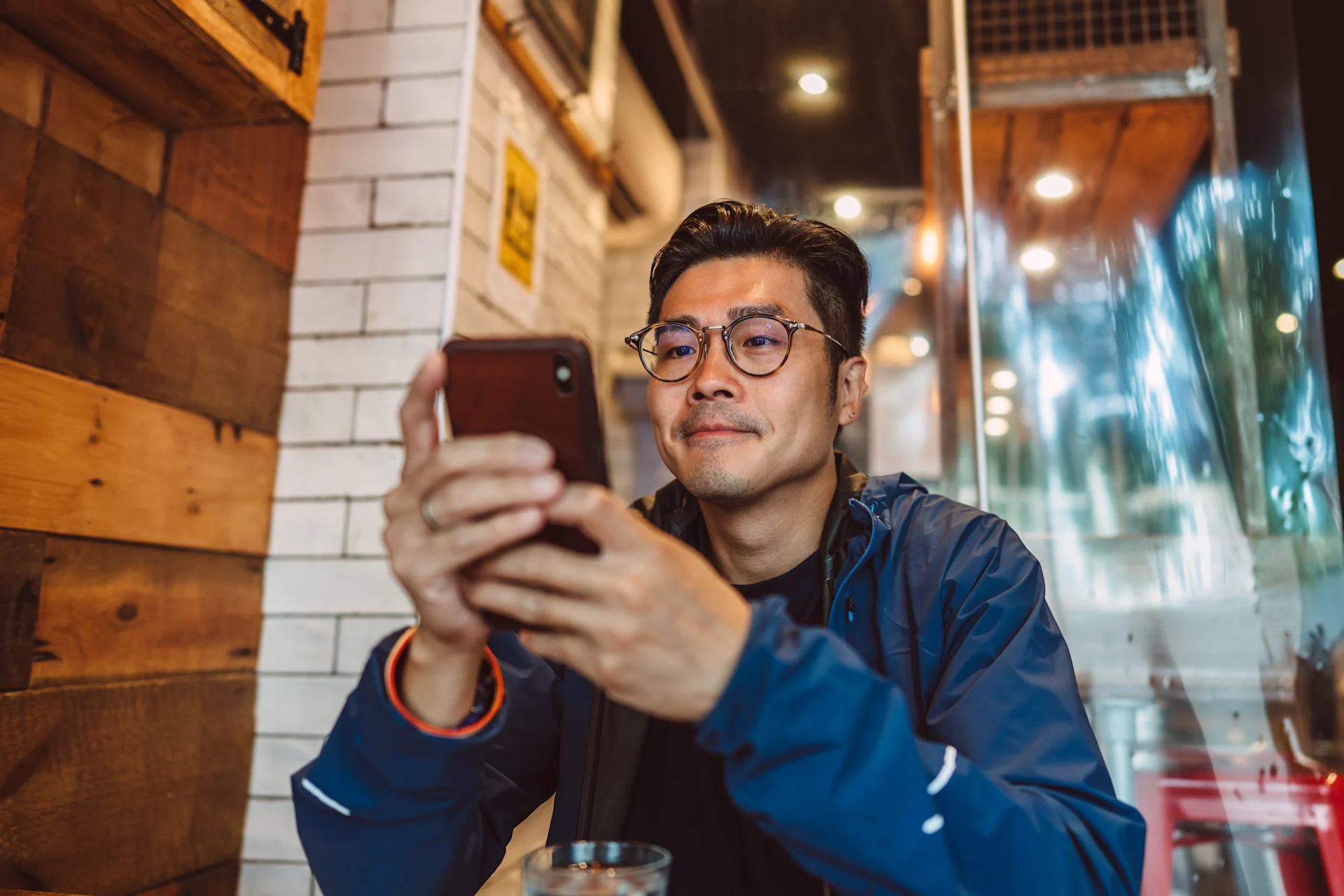 Man looking at an app on his phone.